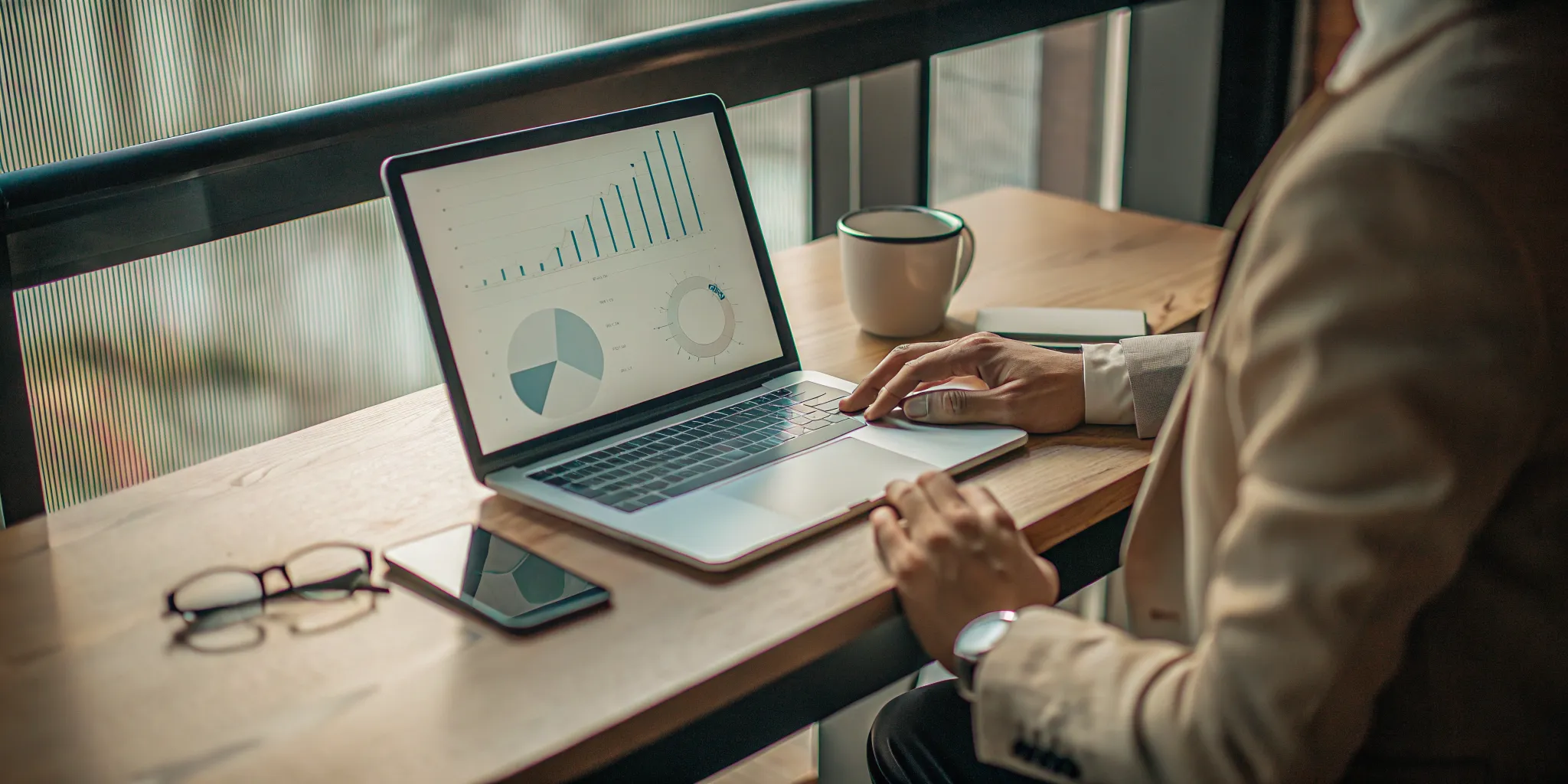 A person planning their financial future with a retirement savings calculator.